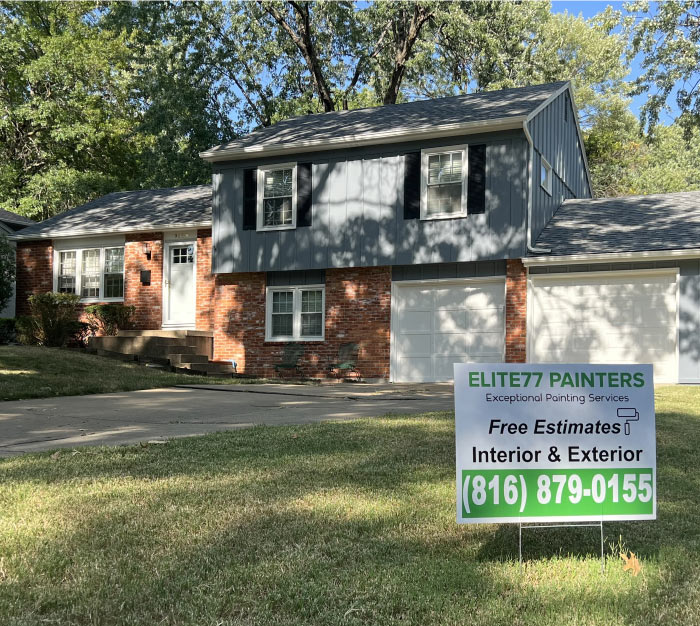 Before and after exterior painting project on a split-level home in Kansas City, showcasing new gray siding and contrasting black shutters by Elite77 Painters